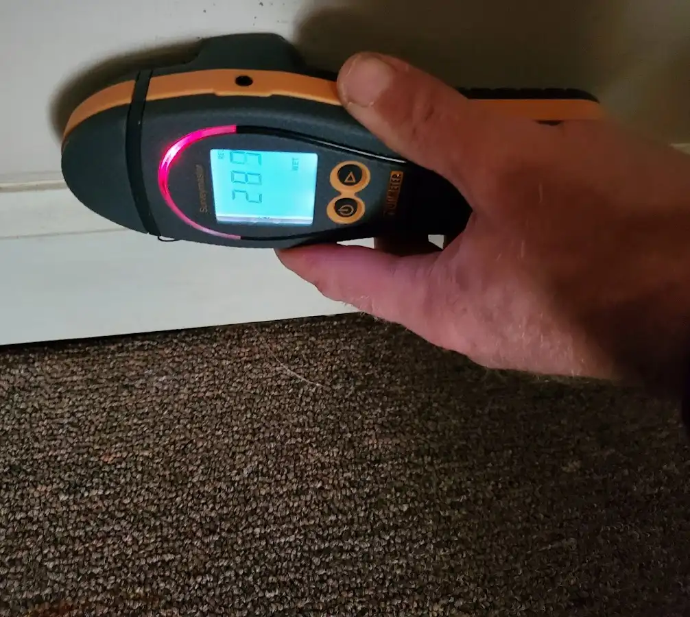 Moisture detection at baseboard during Storm Damage Restoration in Oak View